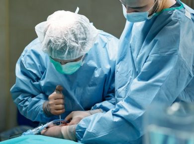 Person in Blue Scrub Suit