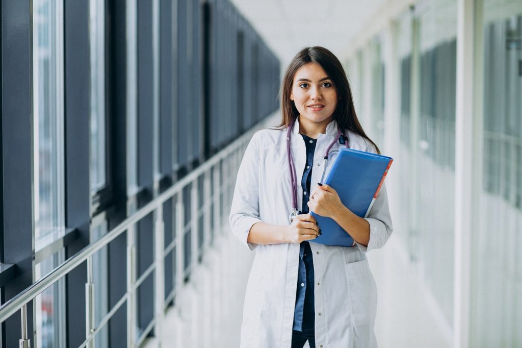Girl standing in corridor